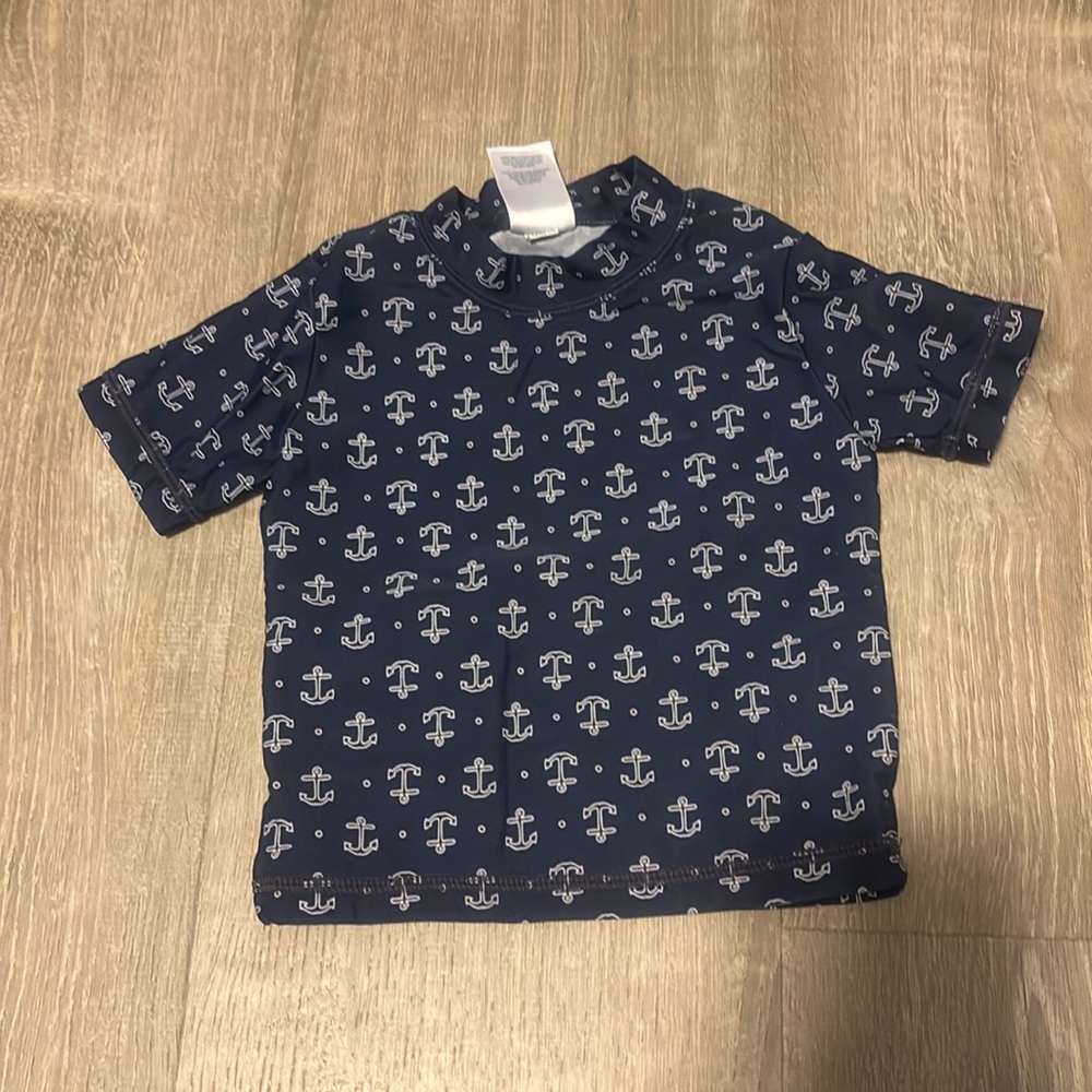 Carter's navy anchor print short sleeved rash guard size 2T EUC